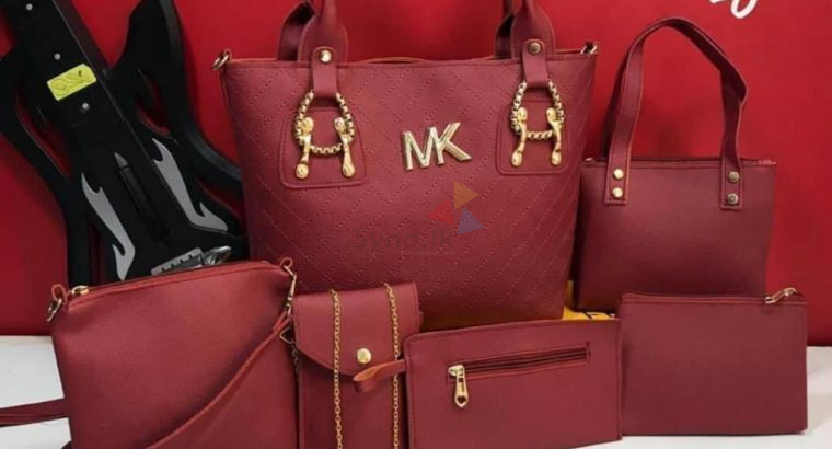 MICHAEL KORES DOUBLE PARTITION 7 PIECE COMBO
