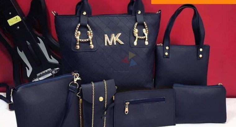 MICHAEL KORES DOUBLE PARTITION 7 PIECE COMBO