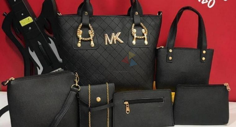 MICHAEL KORES DOUBLE PARTITION 7 PIECE COMBO