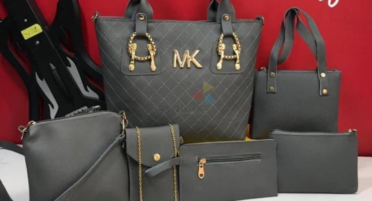MICHAEL KORES DOUBLE PARTITION 7 PIECE COMBO